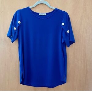Cobalt blue top with silver buttons